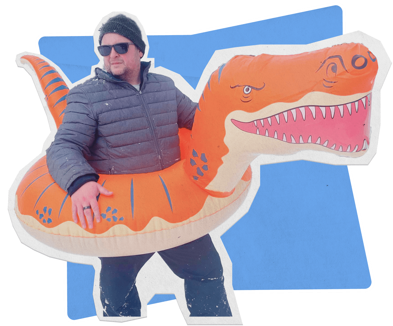 Man in winter gear inside a inflatable dinosaur